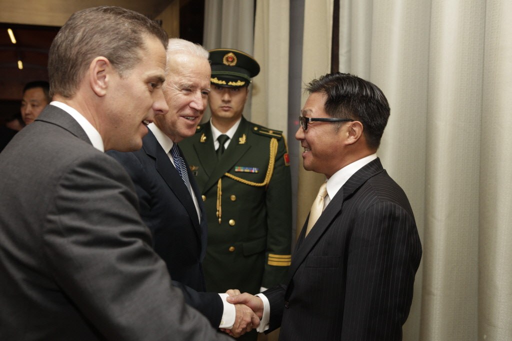 Hunter introduces Joe Biden to Jonathan Li, China, December 2013.