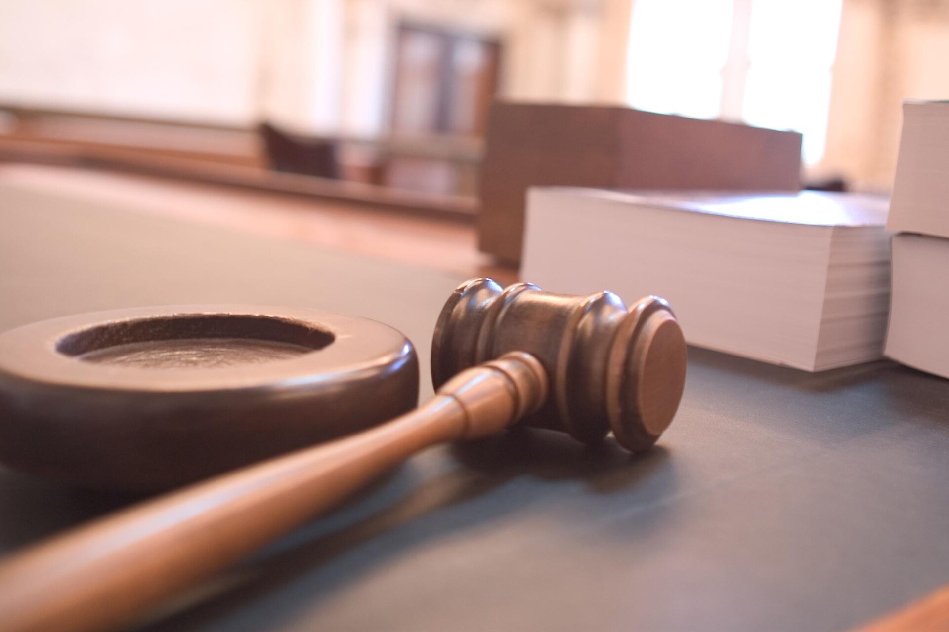 Court gavel still — symbolic, not a photo of a specific hearing.