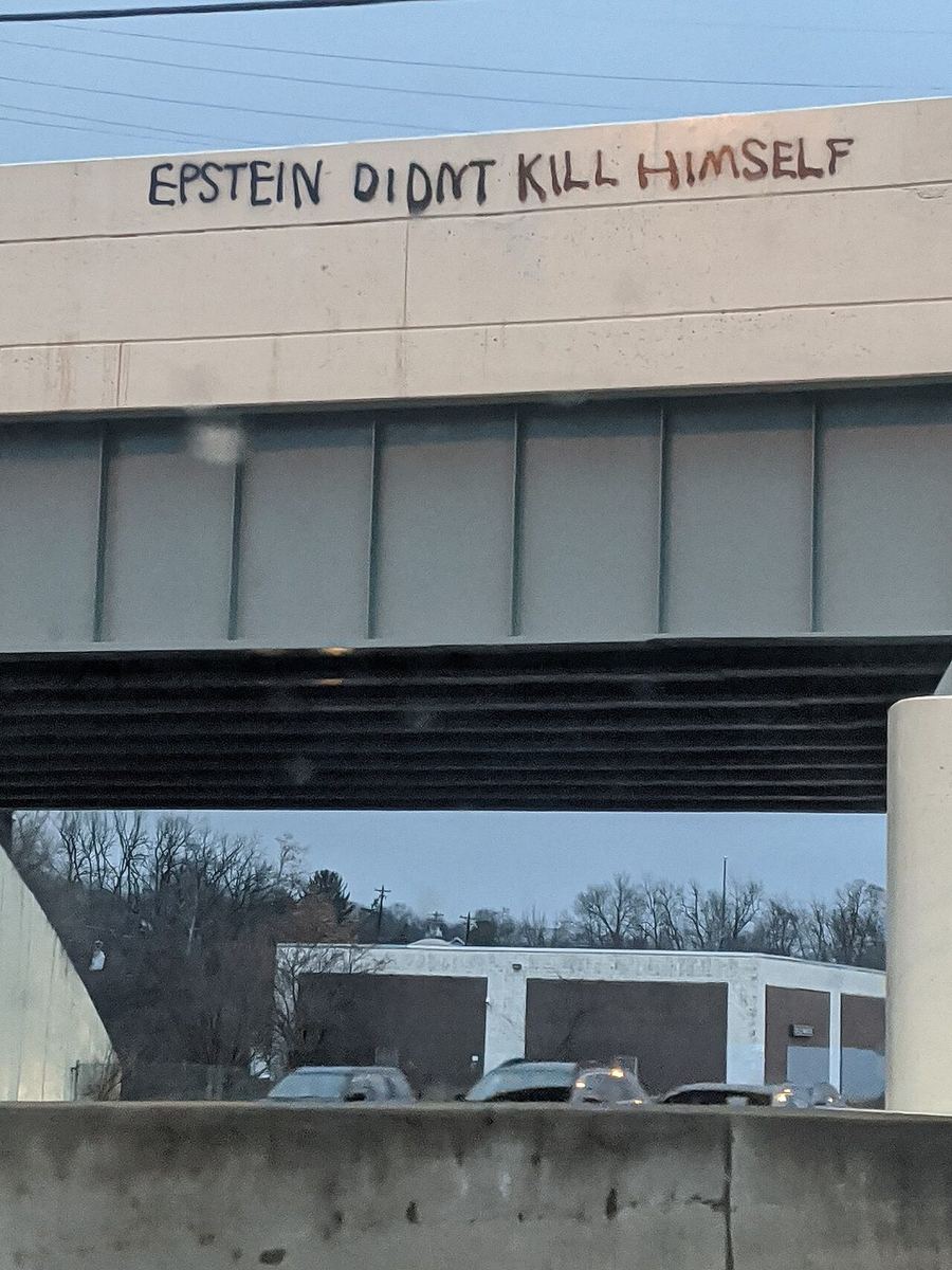 “Epstein didn’t kill himself” graffiti on an I-71 overpass in Cincinnati, November 2019.