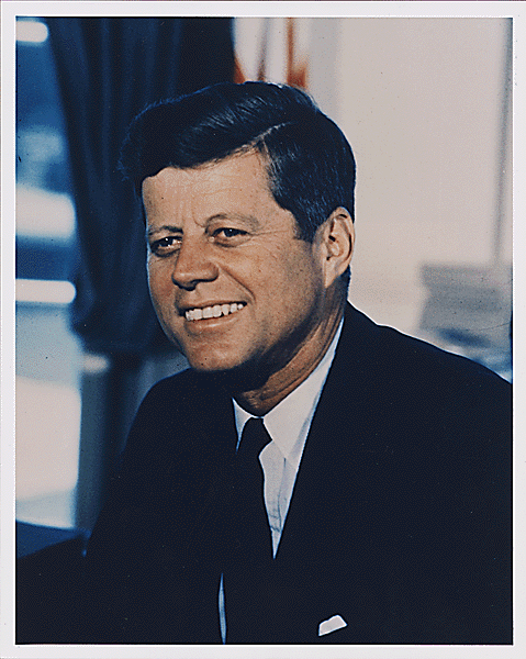 President John F. Kennedy seated in the Oval Office, looking to his right, July 11, 1963.