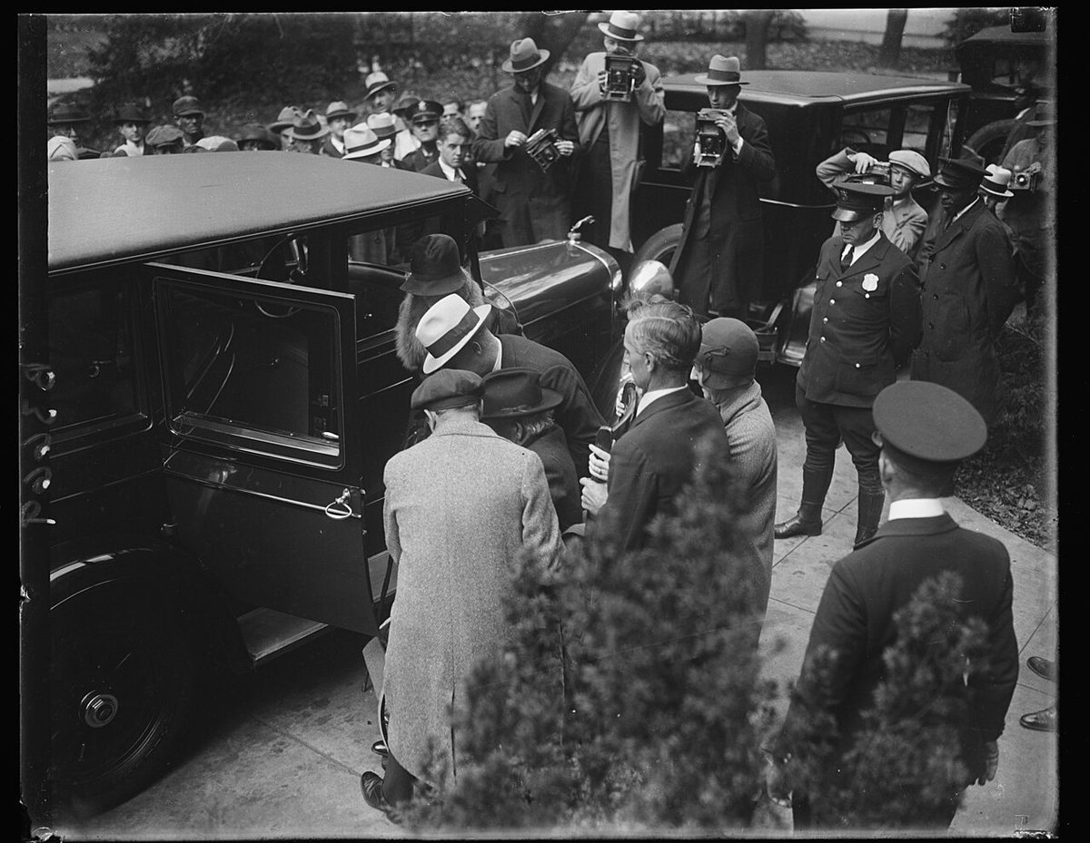 Albert Fall leaving court with his family after the bribery verdict, October 1929.