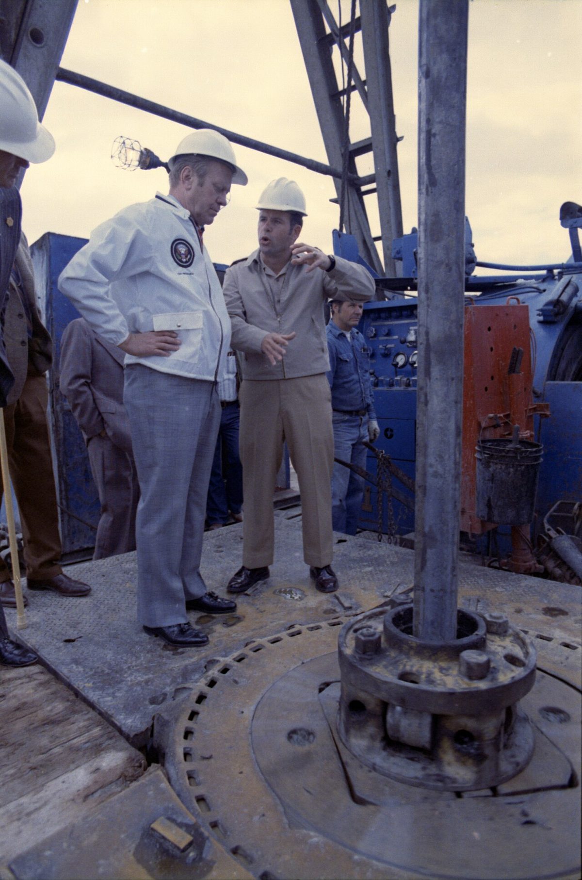 President Gerald Ford tours the drilling site at the Elk Hills Naval Petroleum Reserve, 31 March 1975.