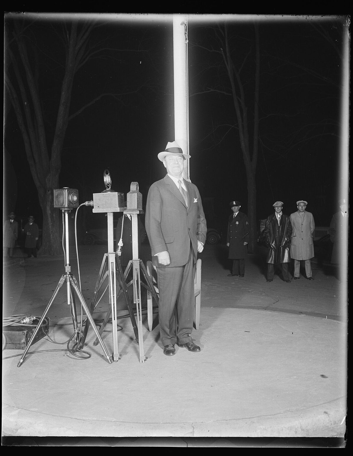 Harry Sinclair steps out of the District Jail a free man, shortly after midnight, November 1929.